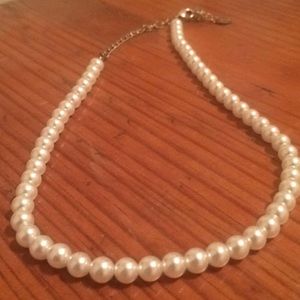 String of faux pearls